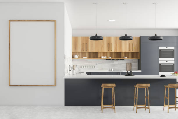 istock Gray and white kitchen with bar and poster 1261210112