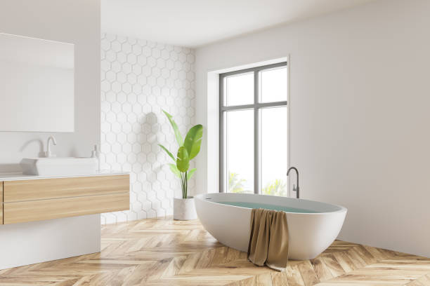 istock White honeycomb tile bathroom, tub and sink 1261210636