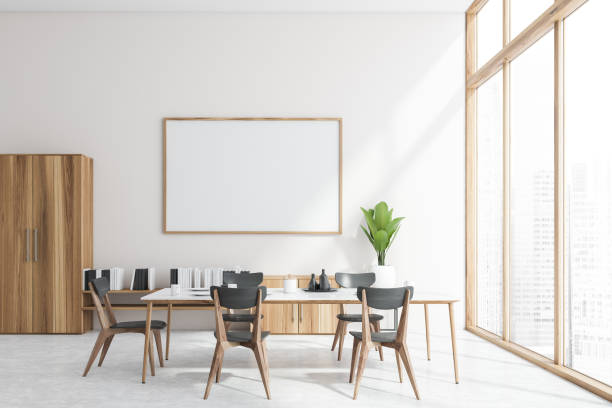 istock White dining room interior, bookshelf and poster 1261214449