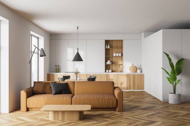 istock White kitchen and living room with sofa 1261219363