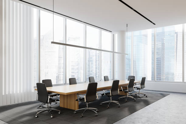 istock Panoramic white office meeting room corner 1261222087