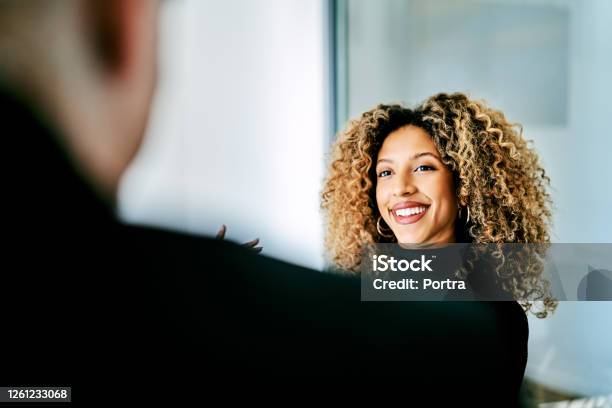 Smiling Businesswoman In Creative Office Stock Photo - Download Image Now - Natural Black Hair, African-American Ethnicity, One Person