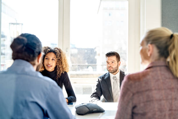 istock Business people discussing in meeting at office 1261235201
