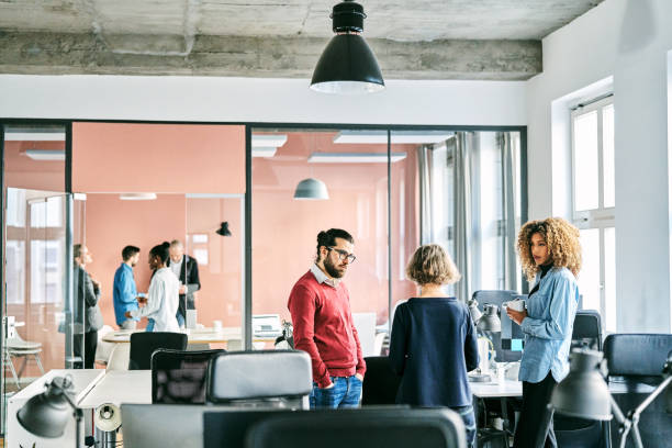 istock Creative business people discussing in office 1261239452