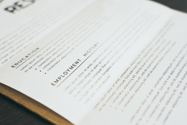 istock Resume or CV on table in HR office, Job seeker concept 1261272194