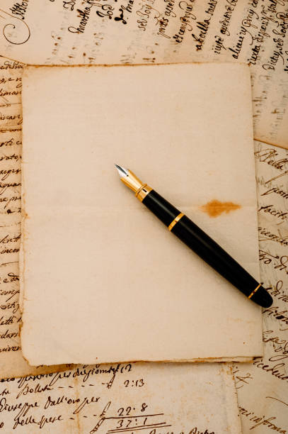 istock Letters and fountain pen 1261280572