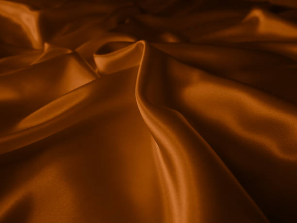istock Beautiful elegant wavy brown satin silk. 1261305118
