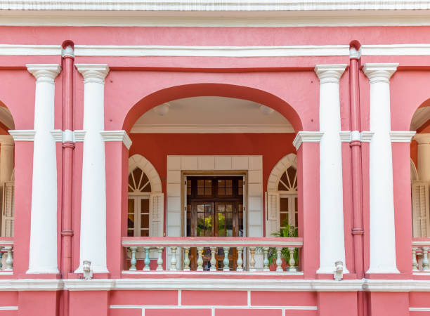 3d illustration. Facade of a classic room with arched windows and a view of the sea.