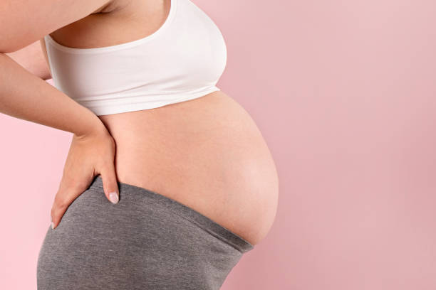 istock Young pregnant female in third trimester. 1261328483