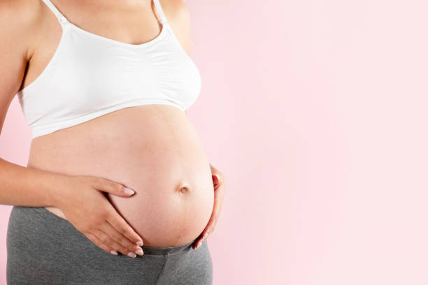 istock Young pregnant female in third trimester. 1261329541