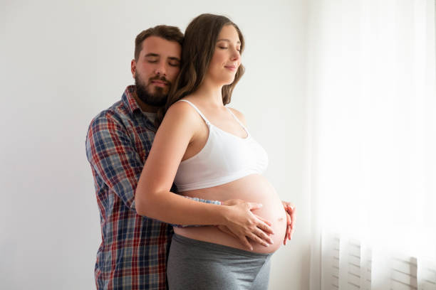 istock Young pregnant female in third trimester. 1261329543