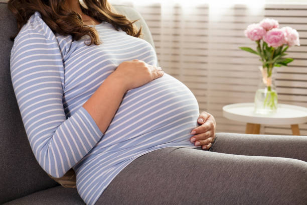 istock Young pregnant female in third trimester. 1261330106