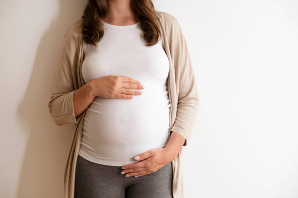 istock Young pregnant female in third trimester. 1261330241