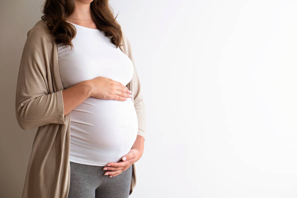 istock Young pregnant female in third trimester. 1261330303