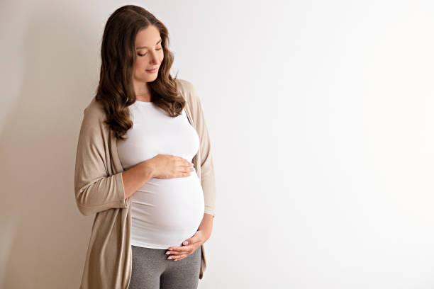 istock Young pregnant female in third trimester. 1261330320