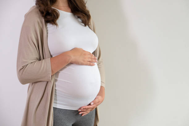 istock Young pregnant female in third trimester. 1261330328