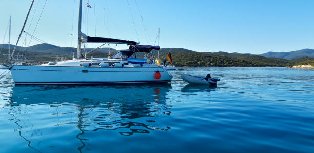 istock Anchored Luxury Boat In Marine 1261332684