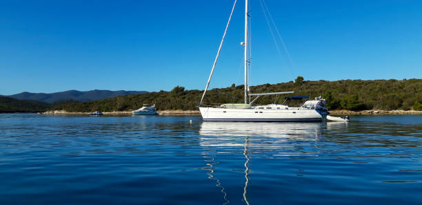 istock Anchored Luxury Boat In Marine 1261335307