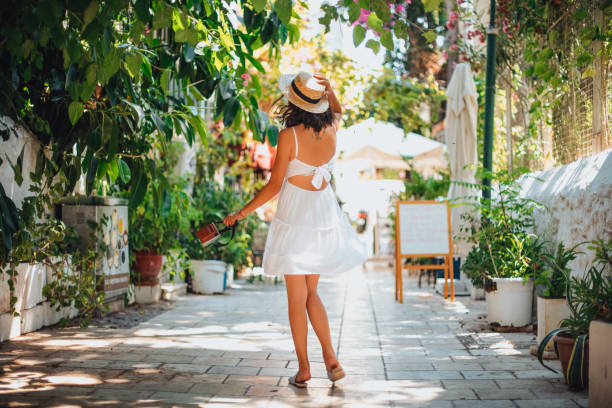 istock Beautiful Young Woman Having Fun on Summer Vacation 1261335825