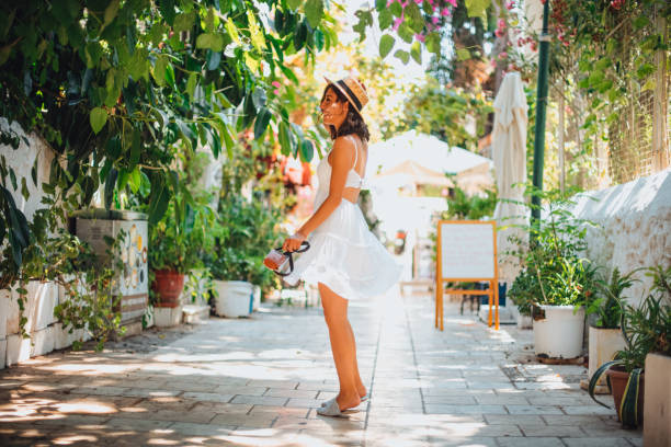 istock Beautiful Young Woman Having Fun on Summer Vacation 1261337478