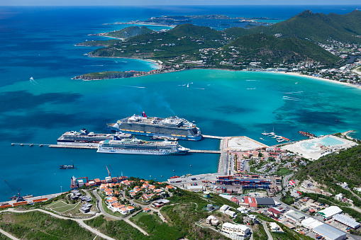 Philipsburg, St. Maarten, Dutch West Indies - October 24, 2012: aerial view of four cruise ships at the dock: Norwegian Gem; Celebrity Summit, Oasis of the Seas and Carnival Dream