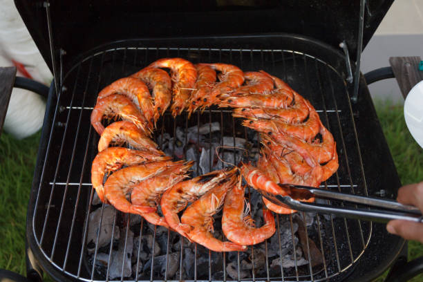 istock shrimp grilled seafood on stove. 1261408334