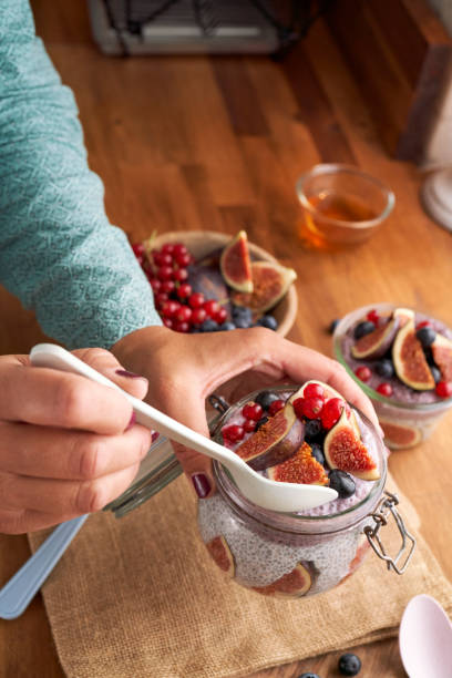 istock Healthy Yogurt with Chia Fresh Figs, Blueberries and Redcurrants 1261449373