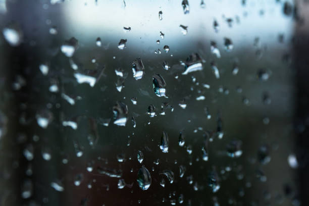 istock A small raindrop rests on the glass after rain. 1261461423