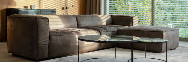 istock Big sofa in living room, panorama 1261463655