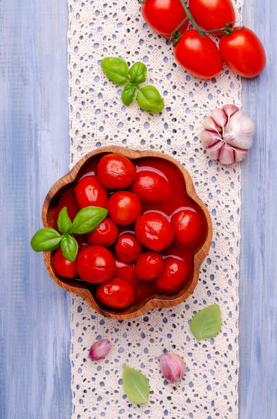 istock Canned tomatoes in their own juice 1261499519