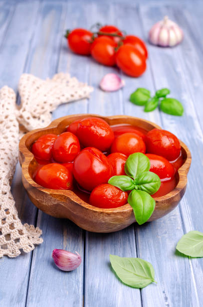 istock Canned tomatoes in their own juice 1261500096
