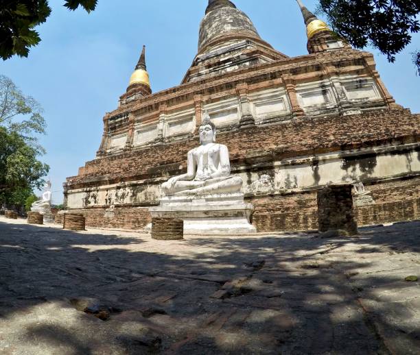 istock A buddha statue and old stupa at Ayutthaya ruins. 1261509028