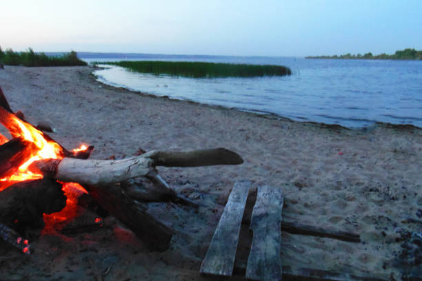 istock bonfire by the lake in the evening 1261530020