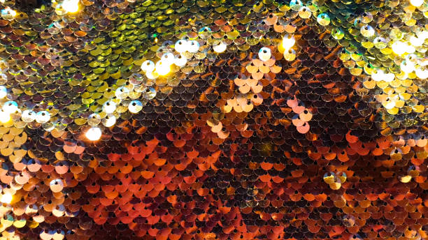 istock Glmour background glitter red gold and rainbow colors sequin 1261530030
