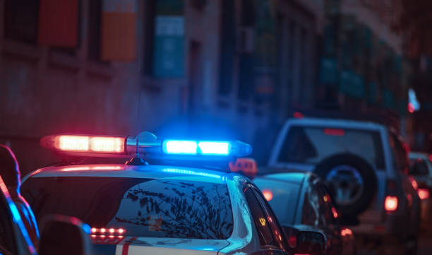 istock Police car at night 1261533343