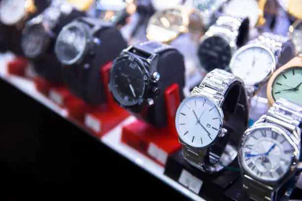 different watches in store background