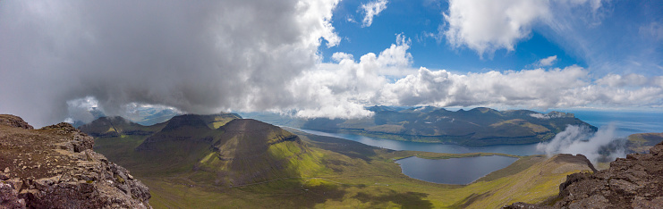 slættaratindur mountain panorama seen from the highest mountain slættaratindur 880metres above see level. slættaratindur is located in the north of the second biggest island eysturoy at the faroe islands, north atlantic ocean.