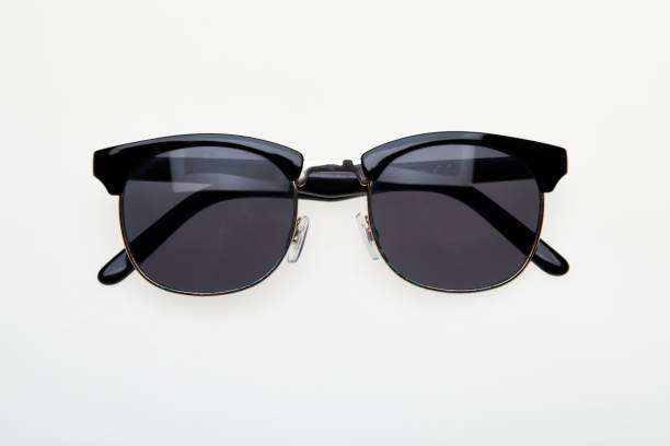 istock Black vintage sunglasses isolated on white background 1261548635