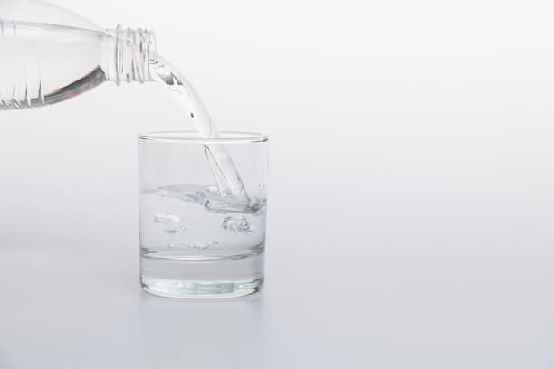 Closeup Glass of water on table nature background