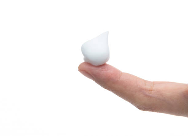 istock Foam bubble on woman finger 1261582518
