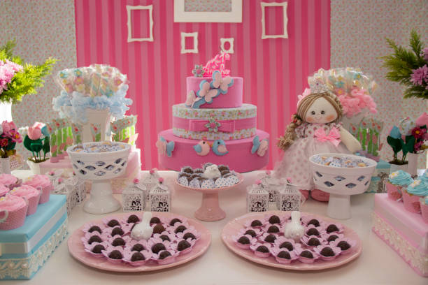 istock Table decorated with cake, candy and brigadier one year anniversary. 1261589912