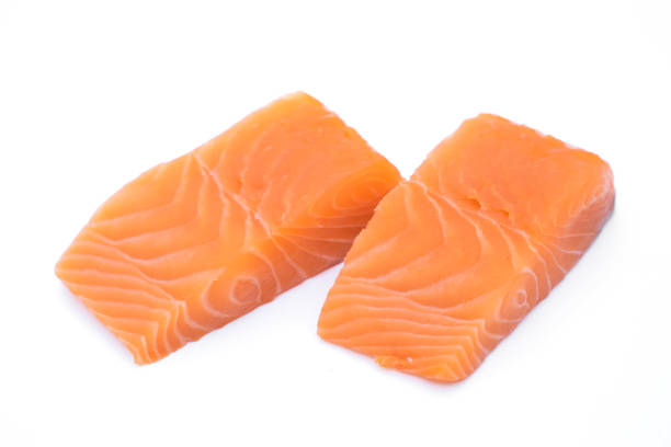 istock fresh raw salmon fillets isolated on white background 1261596131