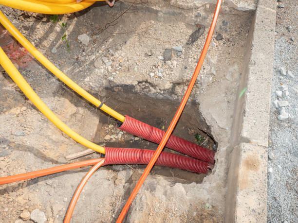 istock Installation of fiber optic cables for telecommunications. 1261614100