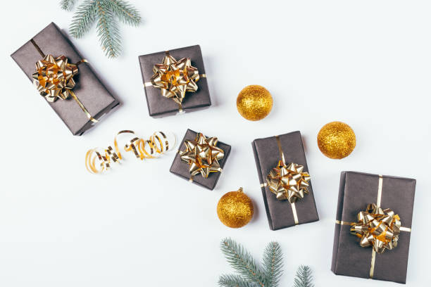 istock Festive Christmas flat lay with black gift boxes 1261658150