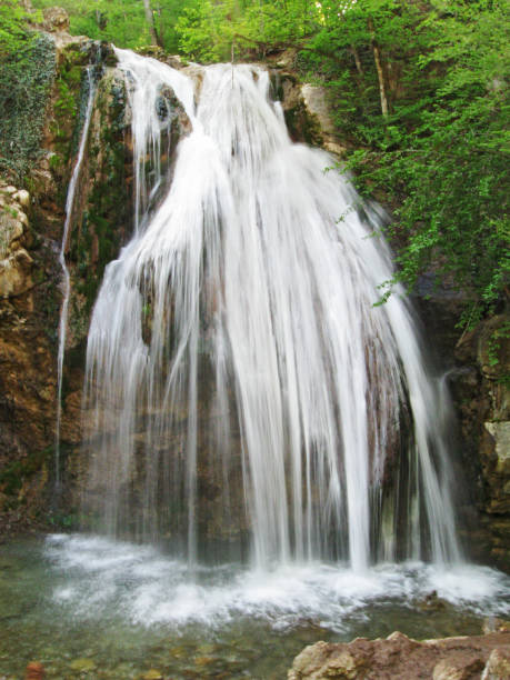 istock Waterfall Jur-Jur in Crimea water motion in spring 1261666282