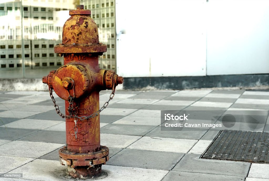 rusty hydrante in the city rusty hydrante in the city in Monterrey, N.L., Mexico Accidents and Disasters Stock Photo