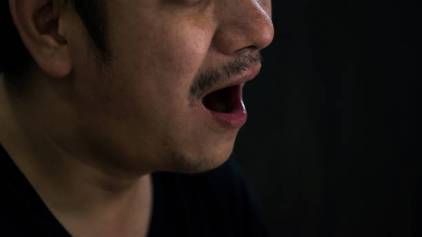 istock unshaven beard man shock and open mouth 1261678290