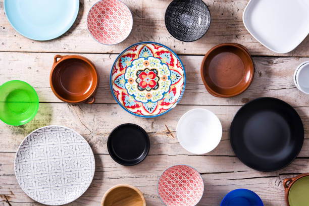istock Set of different empty plates and bowls 1261681616