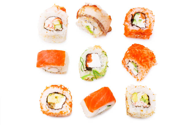 istock diverse delicious sushi roll set on white background. Top view 1261689532