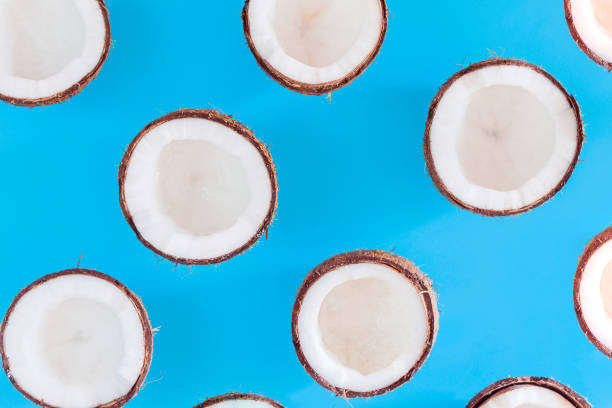 istock Exotic coconut isolated on blue background 1261700141